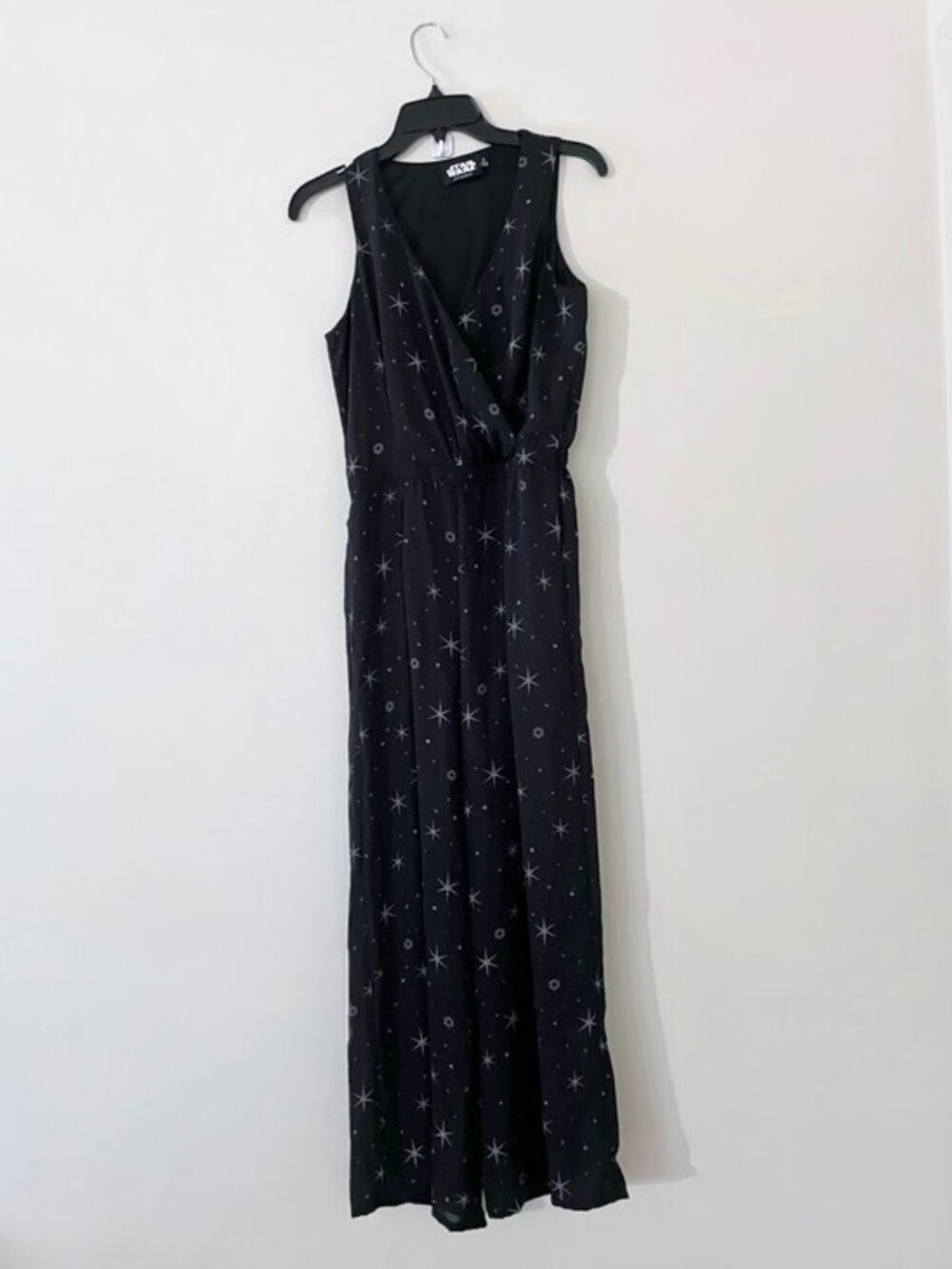 Star Wars Sleeveless v neck jumpsuit romper with elastic waist and star print
